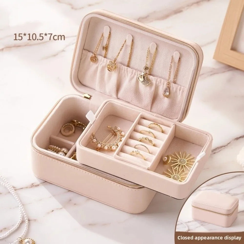 boîte bijoux simili cuir rose clair marron moderne fermeture glissière boucles oreilles bagues colliers