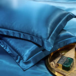 protège oreiller soie uni moderne beige gris rose vert violet bleu opulent brillant 48x74cm