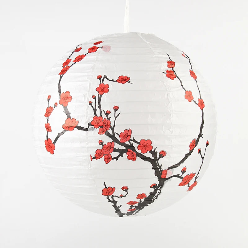 lampe suspendue artisanale fleurs cerisier blanc rouge noir traditionnelle intérieur événement festive