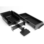 boîte rangement console centrale noire texture mat contemporaine clips fixations compartiments latéraux central lumière
