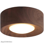 lampe moderne or noir bois brillant éclairage quotidien monté surface minimaliste