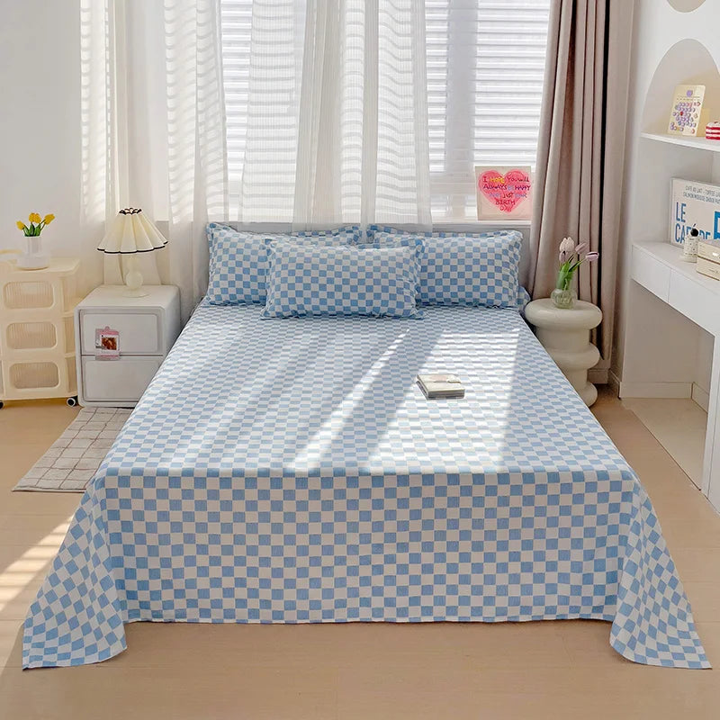 drap lit plat coton bleu clair blanc carreaux géométriques moderne deux oreillers