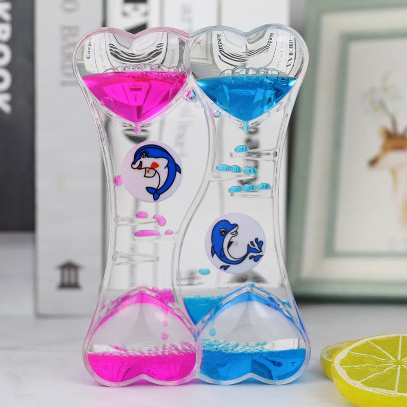 minuteur sablier liquide bicolore transparent motifs géométriques souriant deco moderne