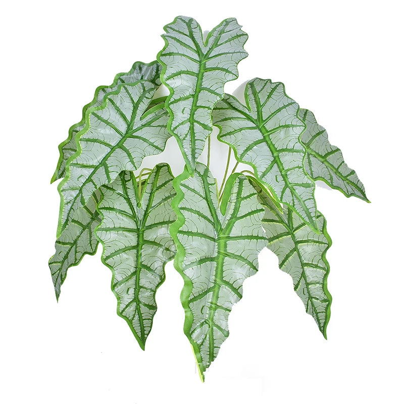 plantes artificielles vertes feuilles larges moderne decoration intérieure feuilles nervures perforations racines apparentes minimaliste