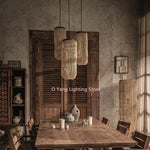 Suspension lumineuse raphia tressé rustique noir beige salon boho chic