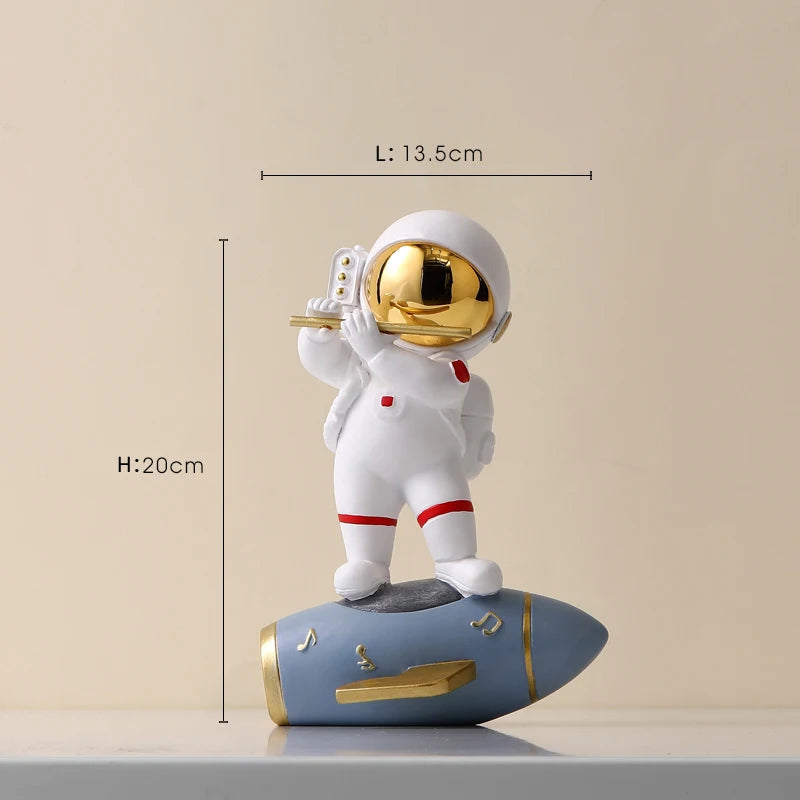 statue astronaute résine saxophone doré guitare violoncelle moderne décoration intérieure chambre salon