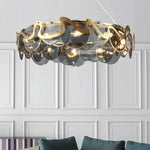 Suspension lumineuse or spirales dorées moderne sphères transparentes 60cm 80cm 95cm