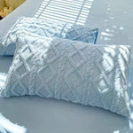 housse coussin décorative motif géométrique couleurs vives moderne blanche bleue orangée rosée lilas verte