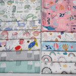 tissu coton imprimé thème marin poissons coquillages enfants blanc rose bleuclair vert