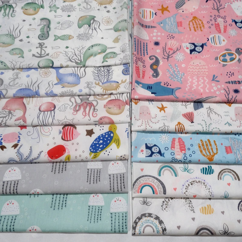 tissu coton imprimé thème marin poissons coquillages enfants blanc rose bleuclair vert