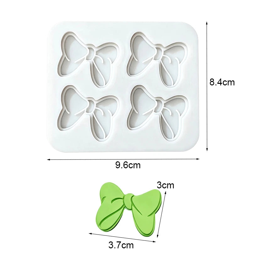 moule silicone nœuds papillons pâtisserie décorative couleurs variées fondant cupcakes