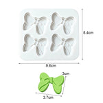 moule silicone nœuds papillons pâtisserie décorative couleurs variées fondant cupcakes