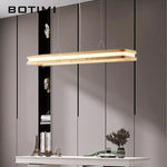 Suspension lumineuse moderne pendentif bois texturé éclairage blanc minimaliste chambre salon étude