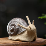 ornements céramique escargots gris artisanal détails sculptés décoration thé animal compagnie miniature imitation antique