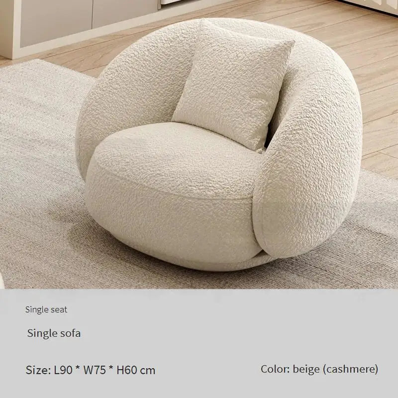 canapé lit blanc bouclé moderne table basse coussins décoratifs