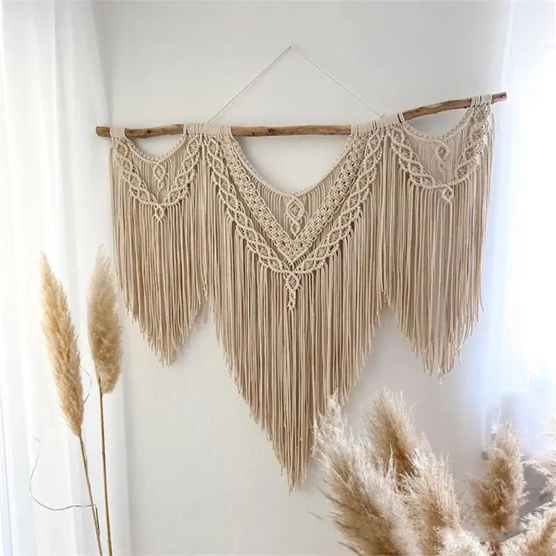 Détail du tissage artisanal de la tapisserie en macramé