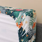 coussin canapé extérieur feuilles tropicales blanc vert orange rose moderne