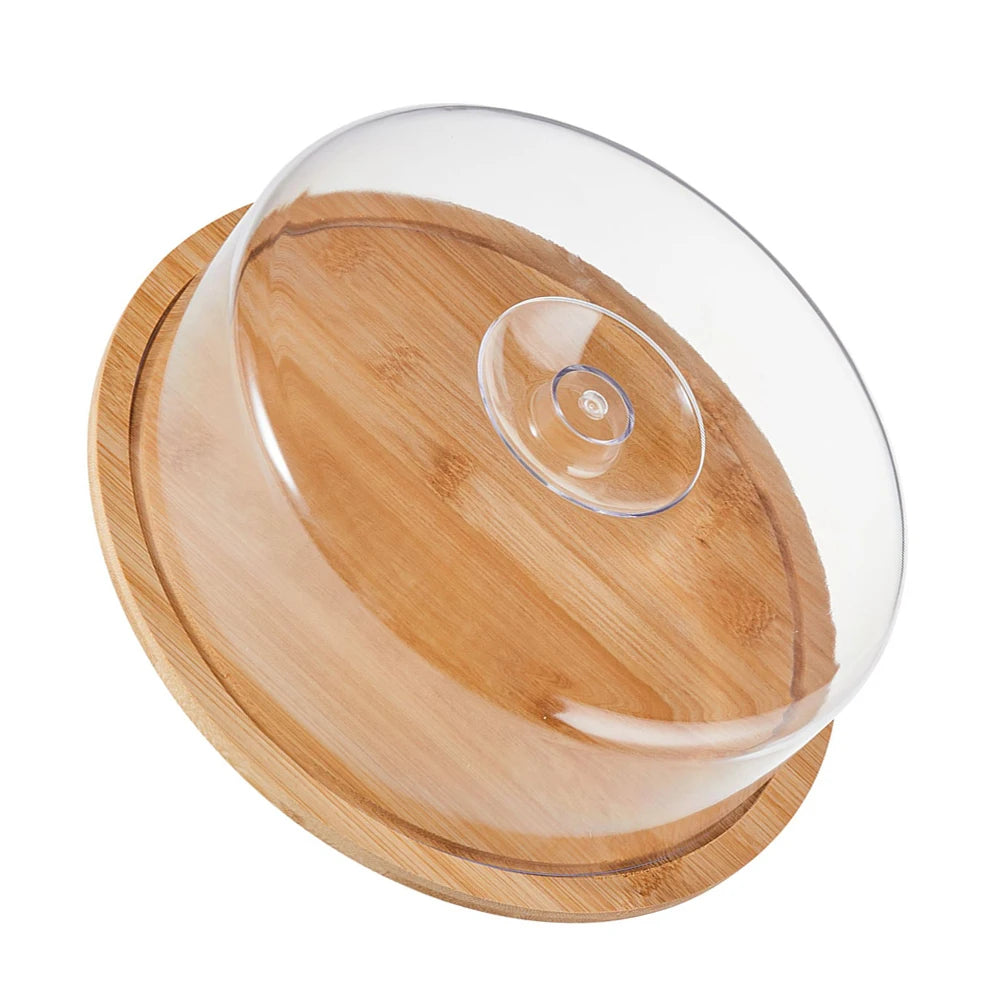 présentation dessert cloche transparente plateau bois clair couvercle poignée central gâteau décorations fruits rouges
