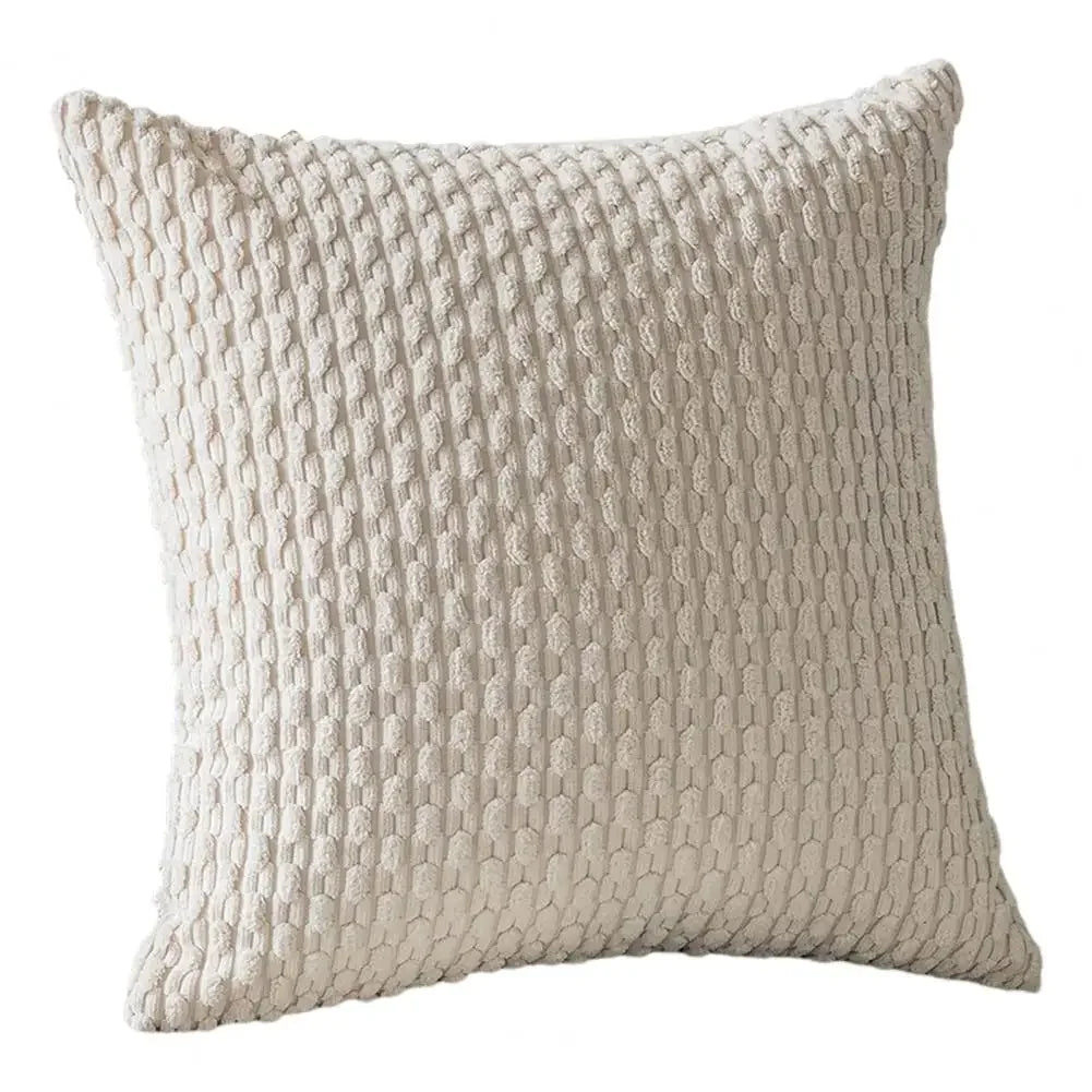 coussin carré beige clair motif géométrique moderne décoration maison salon fauteuil siège intérieur doux