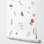 Détail des motifs feuilles sur papier peint adhésif blanc