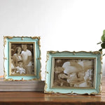 Cadre photo ornements dorés classique rose clair bleu clair décoration table adultes
