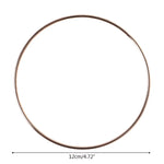 anneaux suspension dorés ronds concentriques métal opaques tailles variées moderneintérieurcoration minimaliste