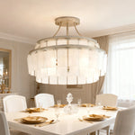 lustre moderne géométrique vert doré blanc transparent chambre salon