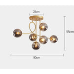 lampe suspendue moderne boules sphériques or noir gris dégradé blanc lait cognac