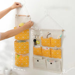 sac rangement mural multiple poches clips magnétiques beige jaune organisation moderne poches utilitaires porte