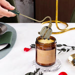 extingueur bougie longue poignée métal fleur stylisée élégant décoration maison cadeau événement