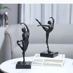 statuette ballerine moderne noire texturée socle deux livres fashion