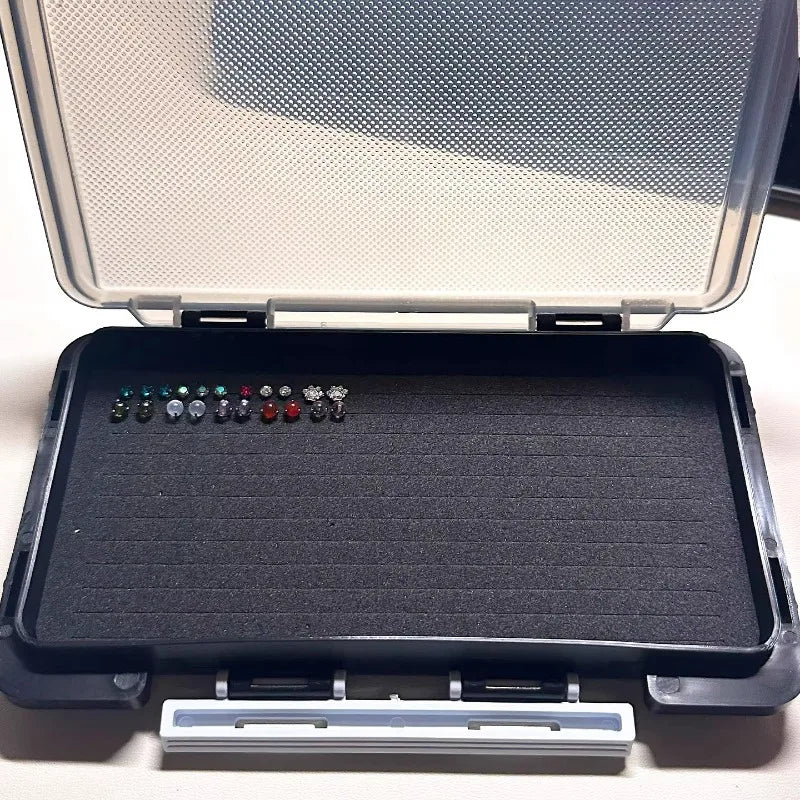 rangements bijoux boîte multicolore brillante pierres précieuses facettées moderne aiguille organiser colliers pendentifs