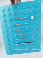 plateau instruments dentaires bleu turquoise texturé cercles relief opaques professionnel