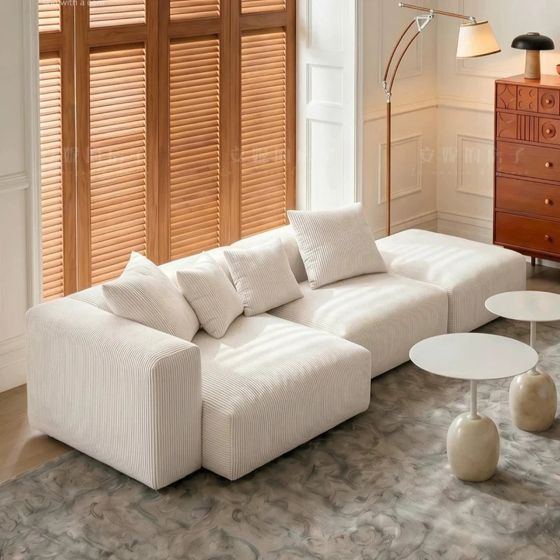 canapé modulable moderne beige clair rayures horizontales convertible cause cœur lit salon