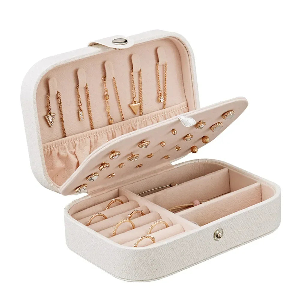boîte bijoux portable cuir velours beige rose bleu marine moderne élégant boucles oreilles colliers