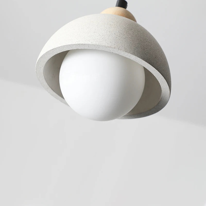 lampe suspendue moderne minimaliste gris clair blanc ampoule led texture béton fixations câble noir