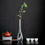 vase verre transparent minimaliste japonais fleurs branches feuilles