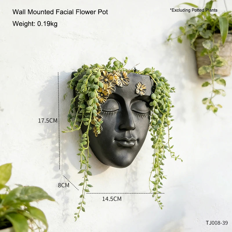 décoration murale résine sculpturale masque noir motif floral doré plante verte fixations