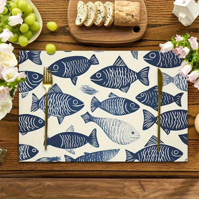 Set de table imprimé motif poisson bleu et blanc sur table