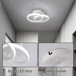 lampe moderne ruban led blanc noir circulaire anneaux superposés suction sécurité