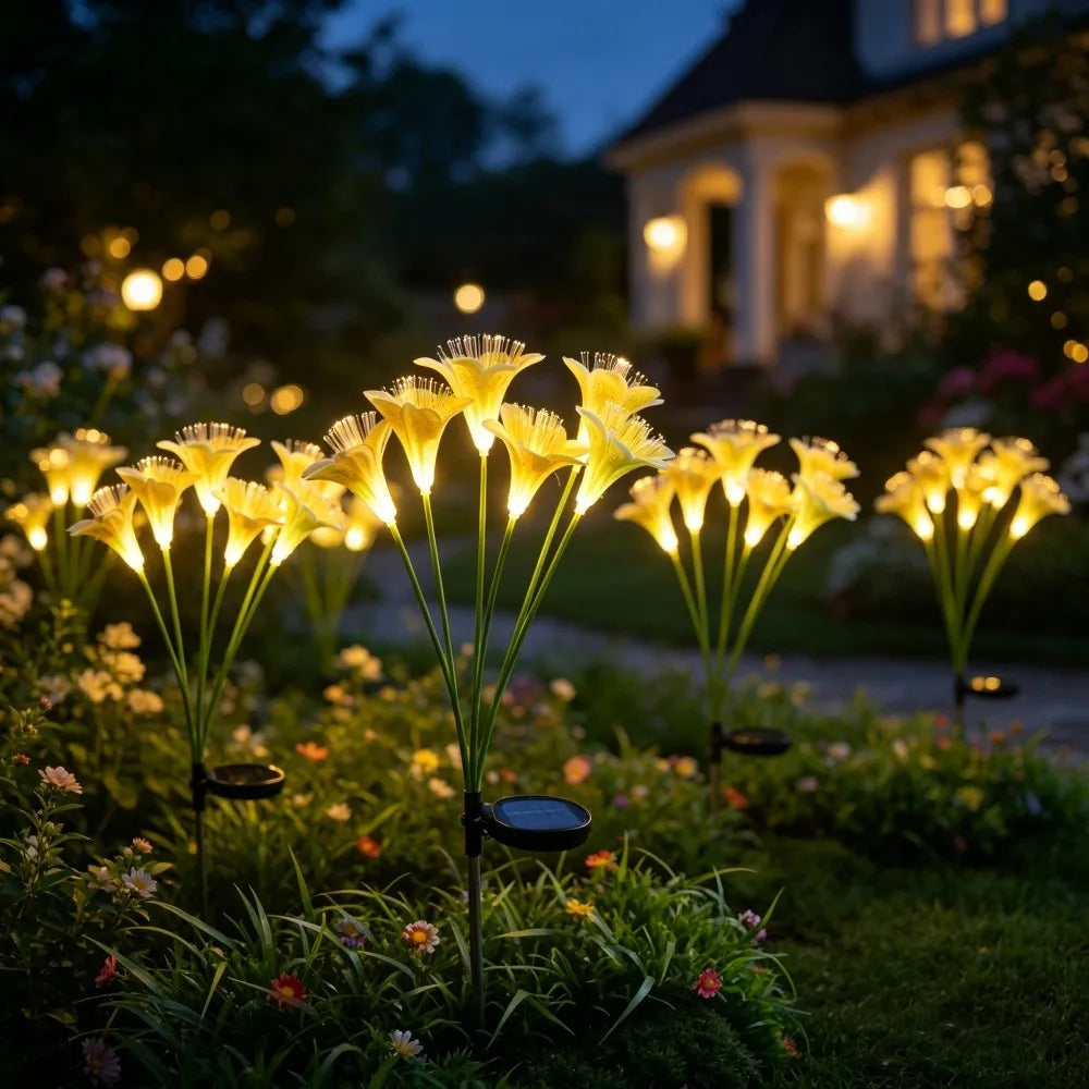 lampions solaires fleurs lys blanc jaune rose modernes extérieurs patio jardin piquet métallique led
