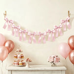 guirlande décorative nœuds papillon satin bleu clair rose noir mariage anniversaire fête