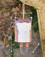 cloches décoratives animaux ours renard hibou motifs poils plumes artisanal extérieur