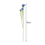 décoration intérieure bouquet fleurs artificielles bleues blanches roses longues tiges vertes vase transparent festonnée