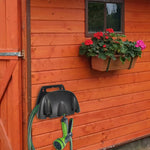 support mural tuyau d'arrosage enrouleur durable orange fixations vis utilitaire jardin maison