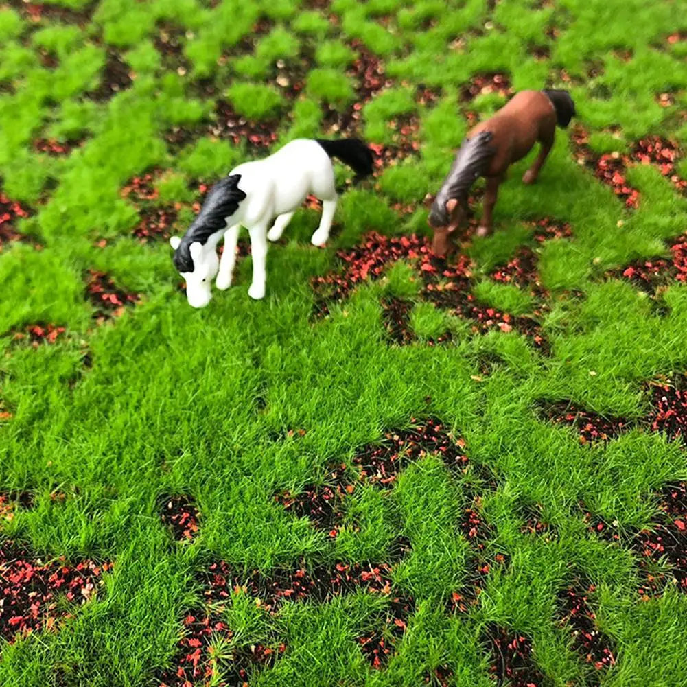 tapis artificiel herbe verte moderne figurines étoiles mer gâteau bouteilles vin decoration extérieure mariage