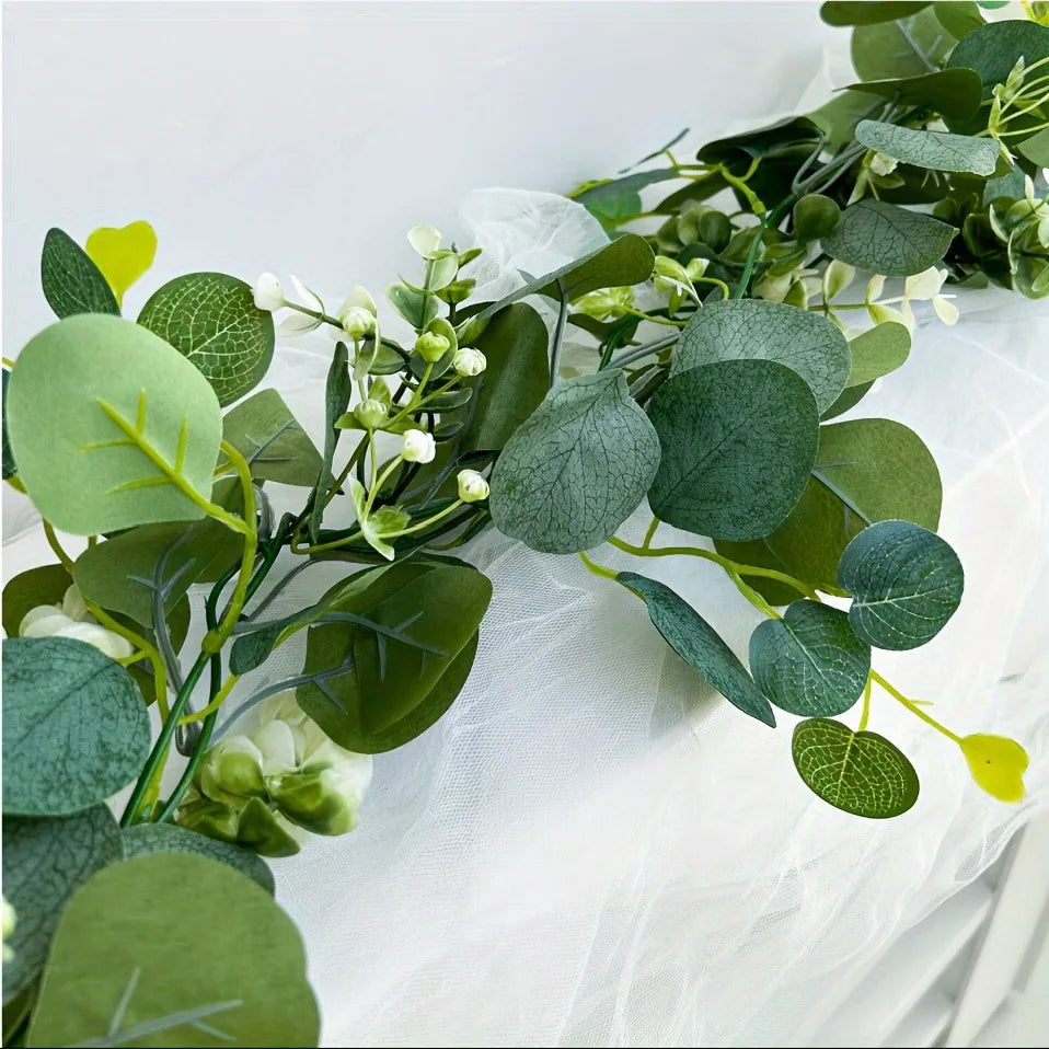 guirlande feuilles eucalyptus artificielles fleurs blanches vert clair décoration extérieure naturelle rustique mariage fête