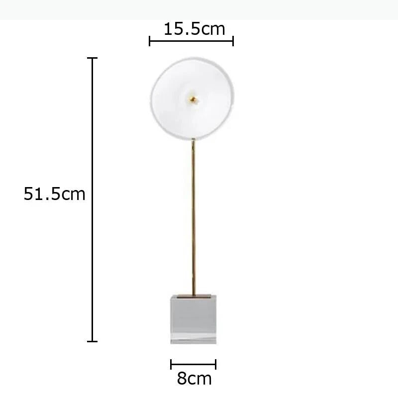 décoration moderne lampes sculpturales transparentes abatjours texturés base cube doré blanc chambre