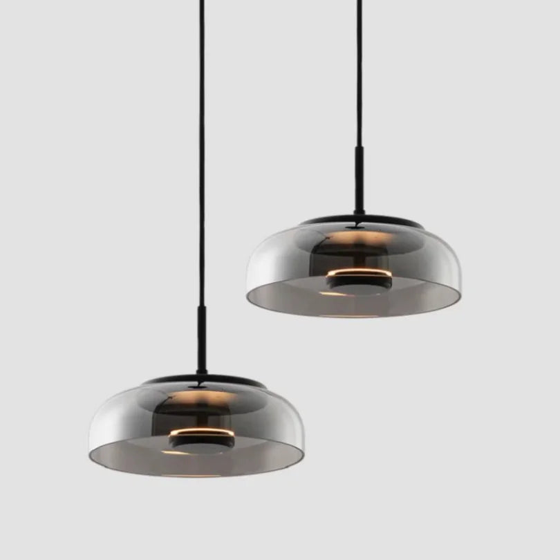 Lampes suspendues modernes transparent doré noir gris abatjour transparent rosace dorée câble suspension LED