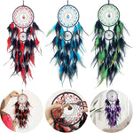 attrape rêves traditionnels plumes cercles concentriques rouge noir bleu vert orange violet rose